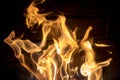red yellow fire in the fireplace close-up. flames. Fire background Royalty Free Stock Photo
