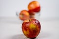 Red Juicy Apple And Glass Bowls With Apples Isolated on White Background Royalty Free Stock Photo