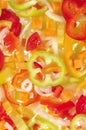 Red, yellow and green bell pepper slices Royalty Free Stock Photo