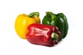 Red yellow green bell peppers fresh on the isolated white background Royalty Free Stock Photo