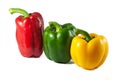 Red yellow green bell peppers fresh on the isolated white background Royalty Free Stock Photo