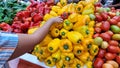 red yellow and green colored peppers for sale in market Royalty Free Stock Photo