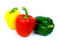 Red, yellow and green peppers, traffic light colors isolated on white background Royalty Free Stock Photo