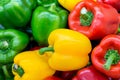 Red and yellow and Green sweet peppers. Pile Three sweet peppers on a wooden background, Cooking vegetable salad .