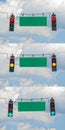 Red, Yellow, and Green Traffic Lights With Blank Street Signs Royalty Free Stock Photo