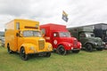 Vintage trucks in a field