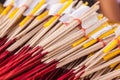 Red and yellow incense sticks Royalty Free Stock Photo
