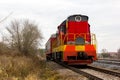 Red-yellow locomotive train on the tracks Royalty Free Stock Photo