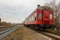 Red-yellow locomotive train on the tracks Royalty Free Stock Photo