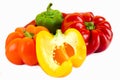 Red, yellow, orange, green bell peppers on white background Royalty Free Stock Photo