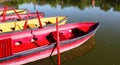 Red and yellow paddle boats Royalty Free Stock Photo