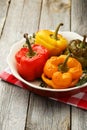 Red and yellow peppers stuffed with the meat, rice and vegetables Royalty Free Stock Photo