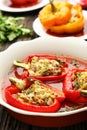 Red and yellow peppers stuffed with the meat, rice and vegetables Royalty Free Stock Photo