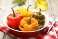 Red and yellow peppers stuffed with the meat, rice and vegetables Royalty Free Stock Photo