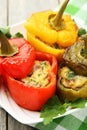 Red and yellow peppers stuffed with the meat, rice and vegetables Royalty Free Stock Photo