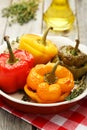 Red and yellow peppers stuffed with meat, rice and the vegetables Royalty Free Stock Photo