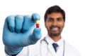 Red and yellow pill presented by medic Royalty Free Stock Photo