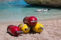 Red and Yellow Scuba Oxygen Tanks for Divers on a Beach Royalty Free Stock Photo