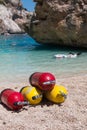 Red and Yellow Scuba Oxygen Tanks for Divers on a Beach Royalty Free Stock Photo