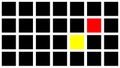 Red and Yellow Squares Breaking a Black Grid Pattern Royalty Free Stock Photo