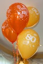 Red and yellow 80th birthday celebration balloons