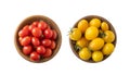 Red and yellow tomatoes lay on white background. Top view. Cherry tomatoes on a wooden bowl isolation. Tomatoes isolated on a whit Royalty Free Stock Photo