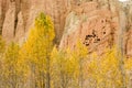 Red and yellow troglodyte dwellings in Dahkmar, Mustang