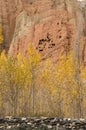 Red and yellow troglodyte dwellings in Dahkmar, Mustang