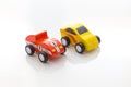 Red and yellow vintage toy cars close up still Royalty Free Stock Photo