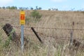 Red and yellow Warning, Fibre Optic Cables In This Vicinity sign Royalty Free Stock Photo