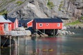 Red and yellow wooden fishing cabins in Norway Royalty Free Stock Photo