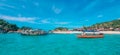 Boats, turquoise water and white sand beach, Redang Island, Malaysia