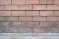 Redbrick wall with cement floor texture for background.