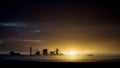 Redcar beach at sunset. Industrial background.