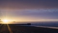 Redcar beach at sunset. Industrial background.