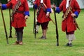 Redcoats with rifles standing to attention Royalty Free Stock Photo
