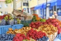 Redcurrants, raspberries, gooseberries, billberries, and other fruit and vegetables for sale at local farmers market Royalty Free Stock Photo