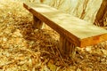 Reddish brown concrete park bench