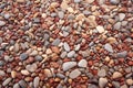 reddish brown pebbles on a path