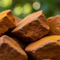 Reddish-brown rocks with a rough, uneven surface texture are stacked, with their Royalty Free Stock Photo