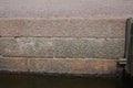 Reddish Brown Wet Brick Wall, Edge of an Old Pier Royalty Free Stock Photo