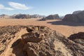 Reddish sand and rock landscapes in the desert of Wadi Rum