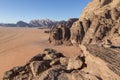 Reddish sand and rock landscapes in the desert of Wadi Rum