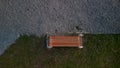 reddish wood benches on their paneling under the benches is a rectangle Royalty Free Stock Photo