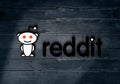 Reddit social media logo on dark