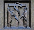 The redemptive death of Christ depicted in the emblem of the bronze serpent, door of the Grossmunster church in Zurich Royalty Free Stock Photo