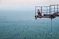 A stalker sitting on top of the overhorizon antenna array DUGA in Chernobyl zone