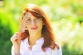 Redhair woman enjoying autumn weather. Beautiful fall time in nature. Royalty Free Stock Photo