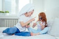 Redhaired ginger woman and foxy little girl make cucumbers clay mask