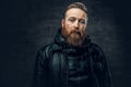 Redhead bearded male in leather jacket. Royalty Free Stock Photo